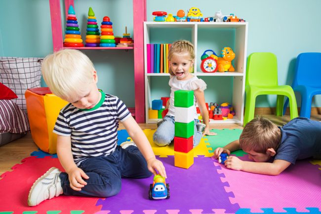 cute-boy-playing-with-toy-sitting-table (2)
